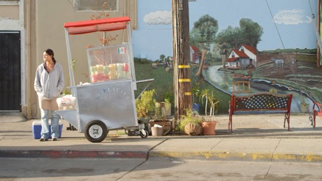 Juana (Diana Elizabeth Torres) works at a Fruitvale fruit cart. Photo courtesy Anthony Lucero